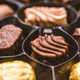 Illustration for article titled Ghirardelli and Russell Stover fined $750,000 for excessive candy packagingem/em